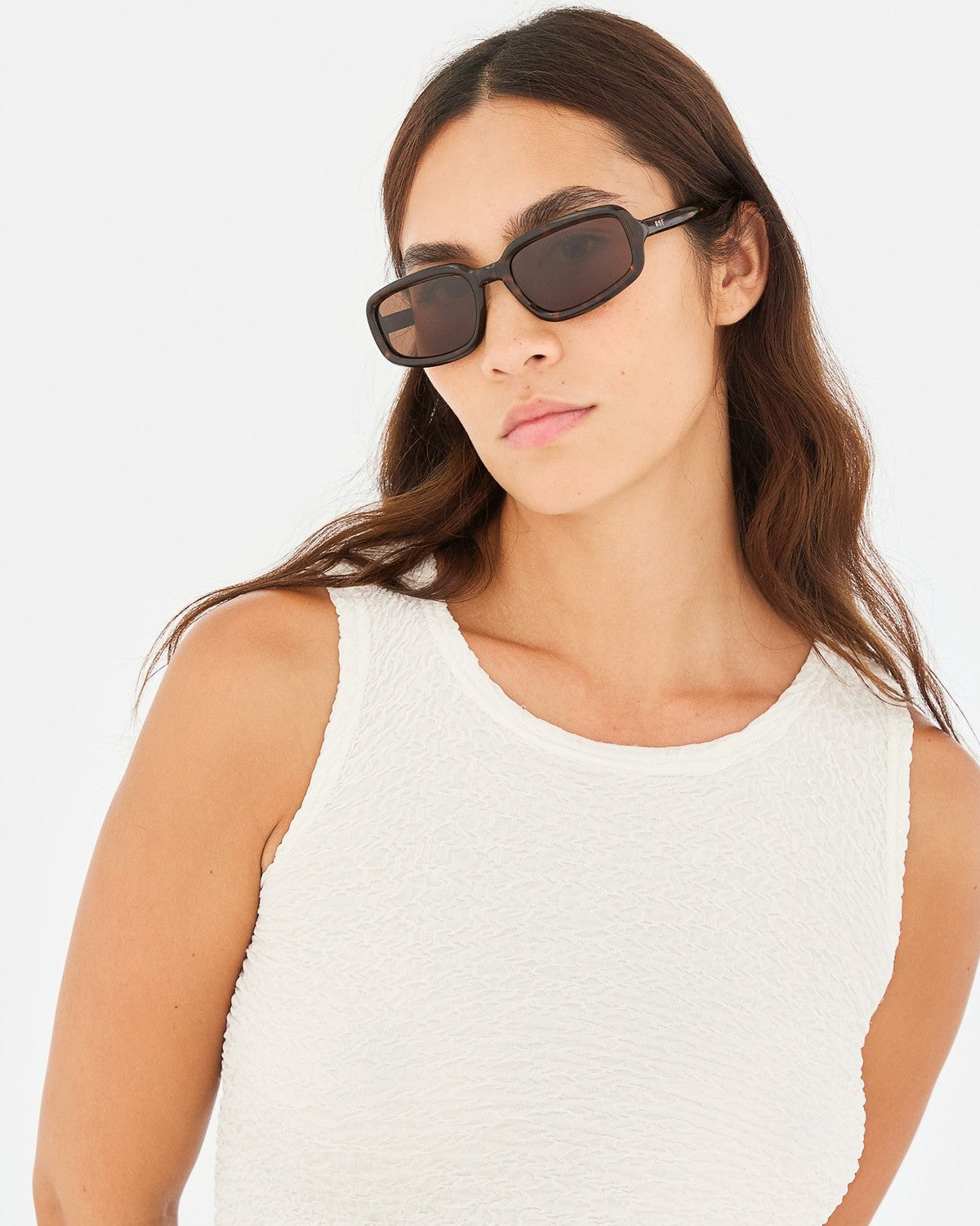 Model wearing RETROSUPERFUTURE Troll Burnt Havana sunglasses.