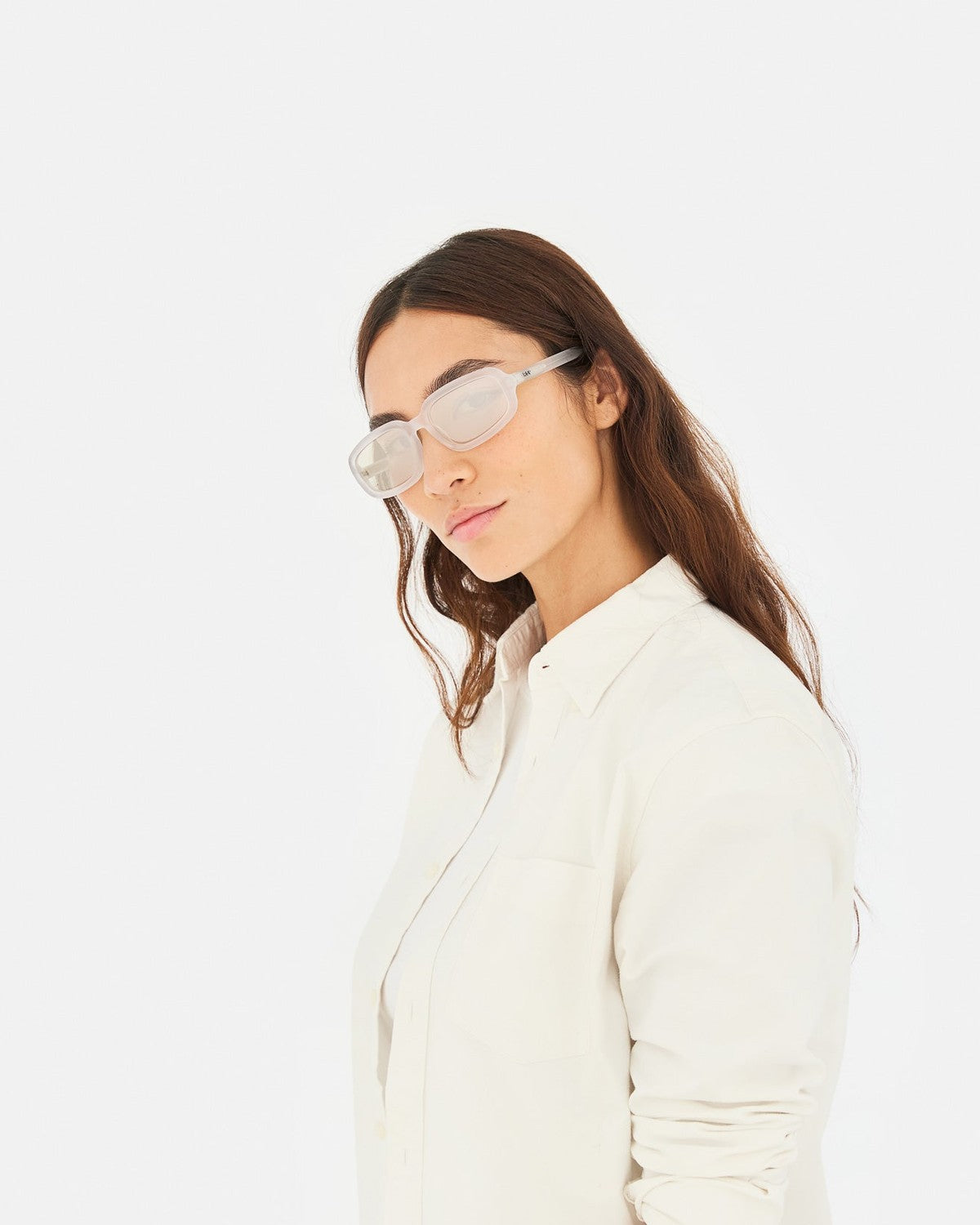 Model wearing RETROSUPERFUTURE Troll Frozen sunglasses.