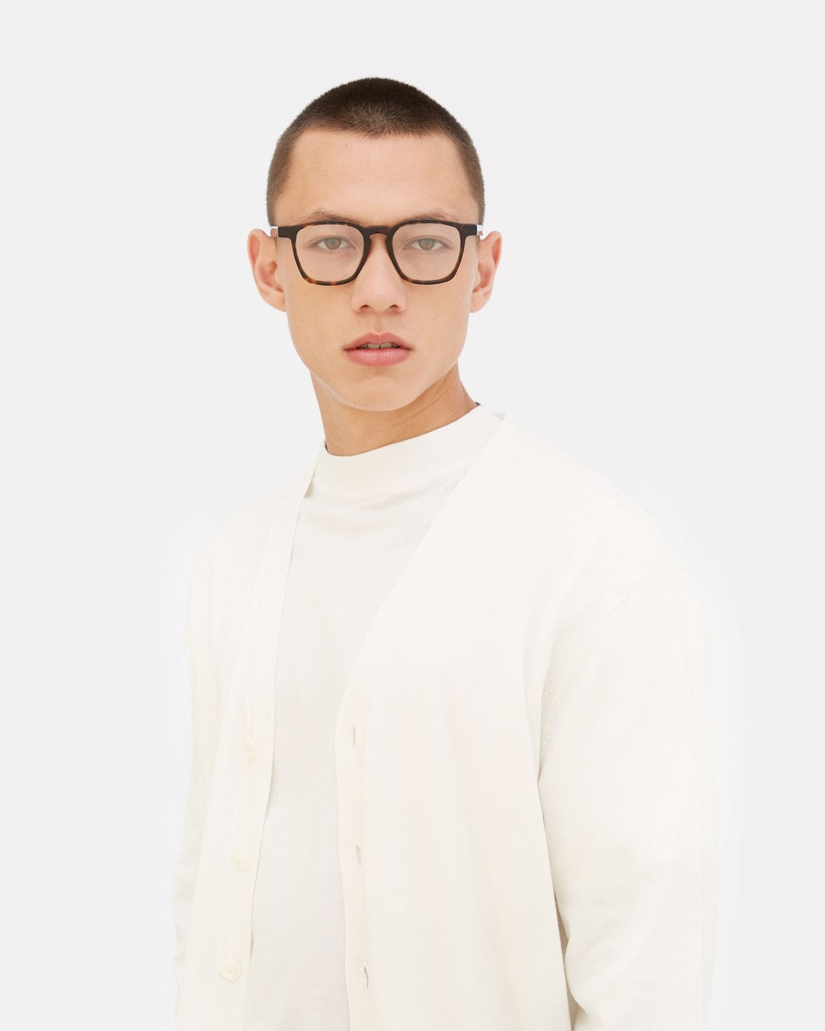 Model wearing RETROSUPERFUTURE Unico 3627 eyeglasses, front view.