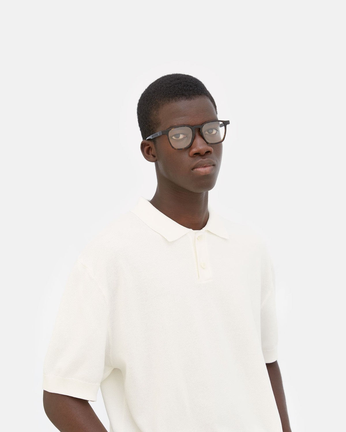 Model wearing RETROSUPERFUTURE Unico 3627 eyeglasses, angled view.