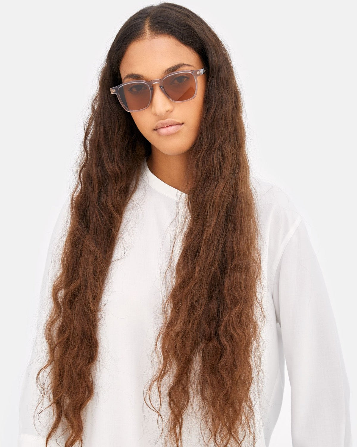 Model wearing RETROSUPERFUTURE Unico Stilo sunglasses.