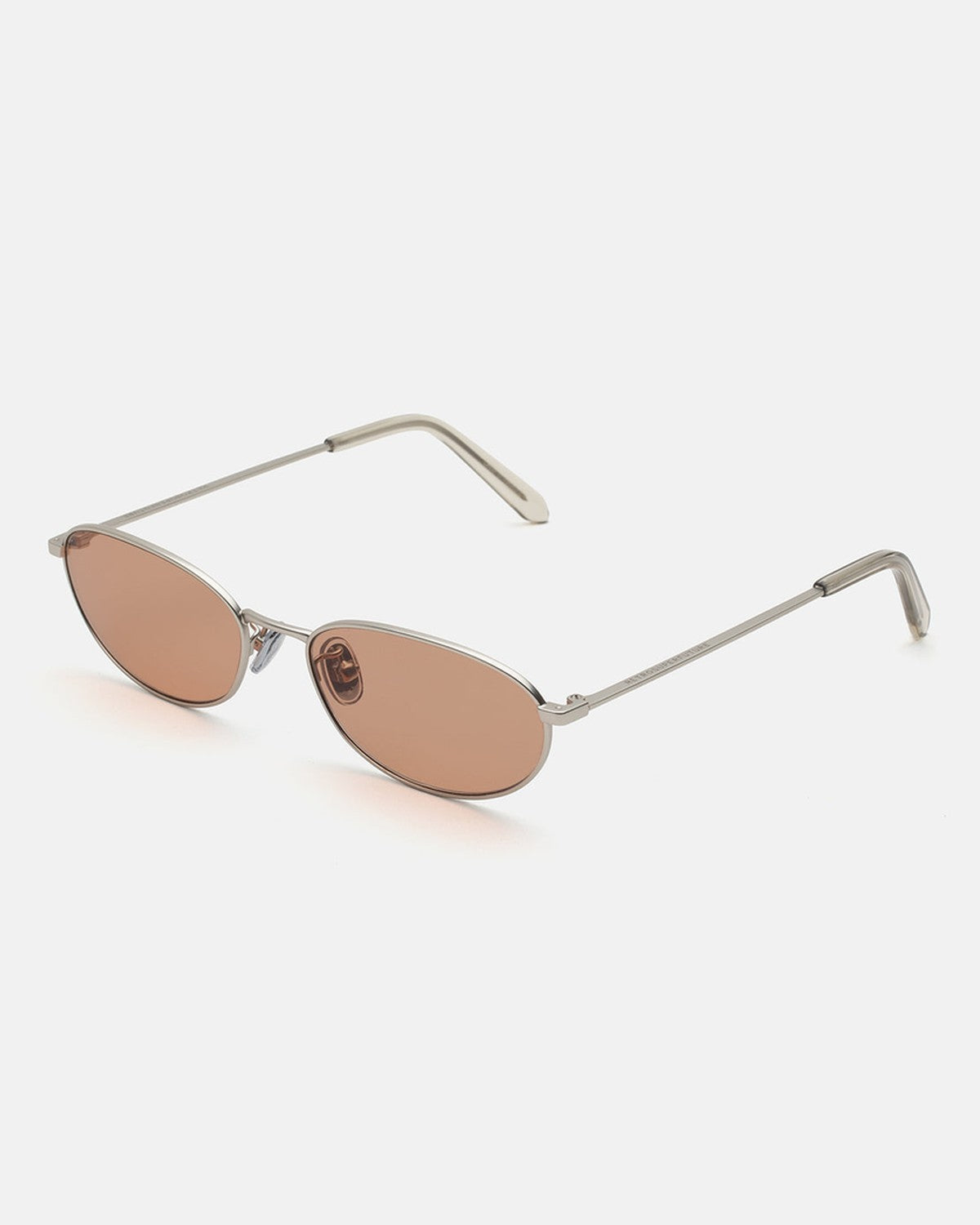 Angled view of RETROSUPERFUTURE Uovo Nebbia Rosa sunglasses.