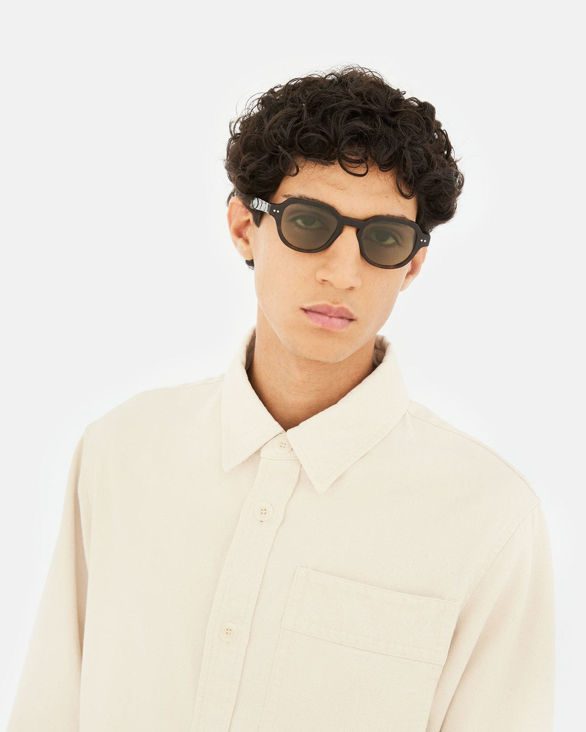 Model wearing RETROSUPERFUTURE Voce 3627 sunglasses facing forward.