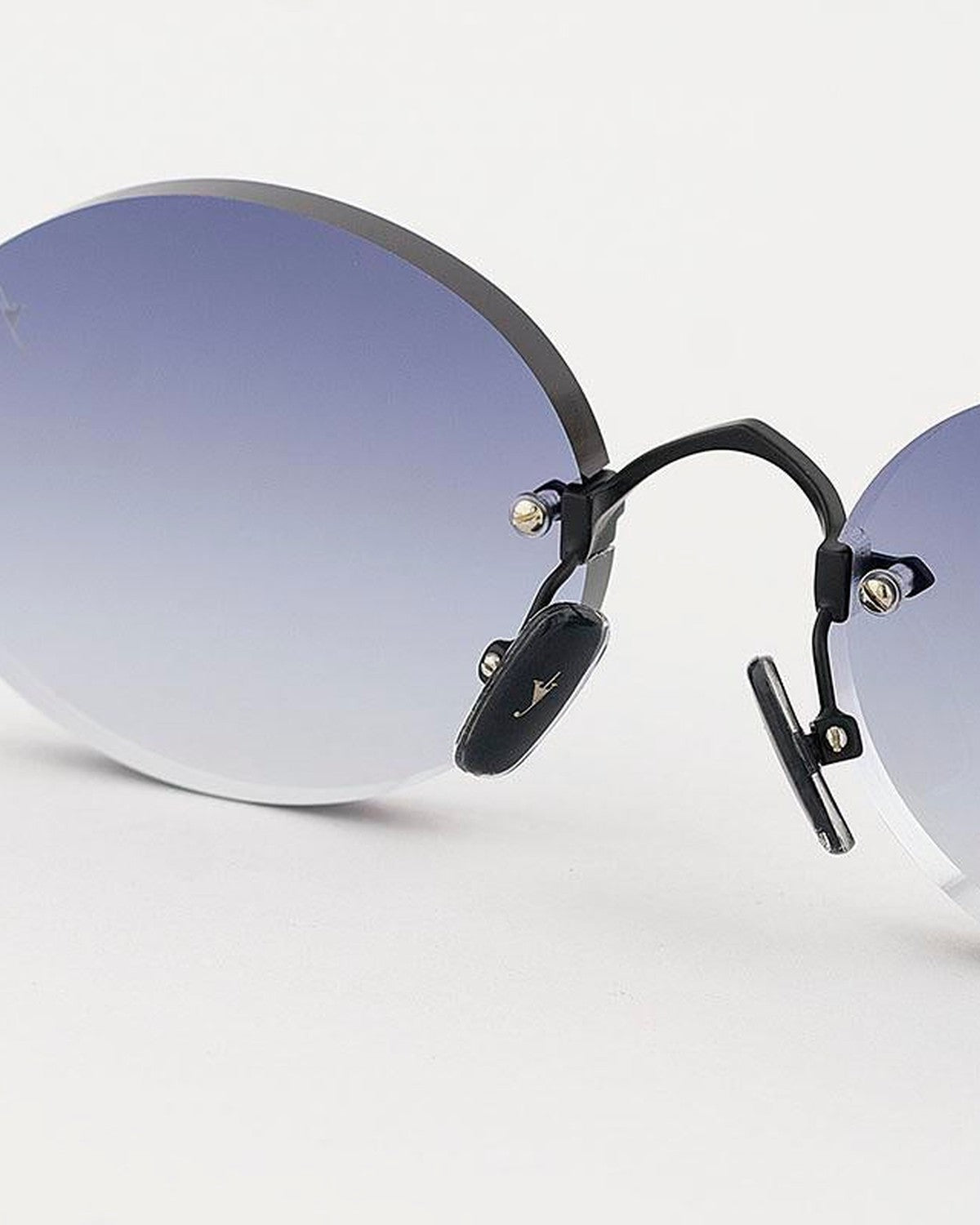 Detail of the nose bridge and decorative hardware on EYEPETIZER WILMOT C.6-51 sunglasses.