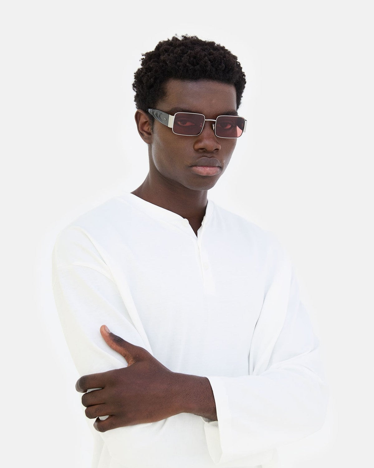 Model wearing RETROSUPERFUTURE Z Bordeaux sunglasses in three-quarter view.