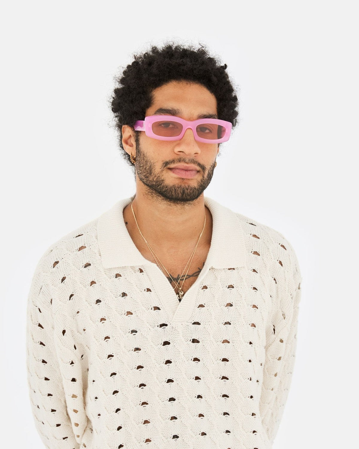 Model wearing RETROSUPERFUTURE Zaga Pink sunglasses.