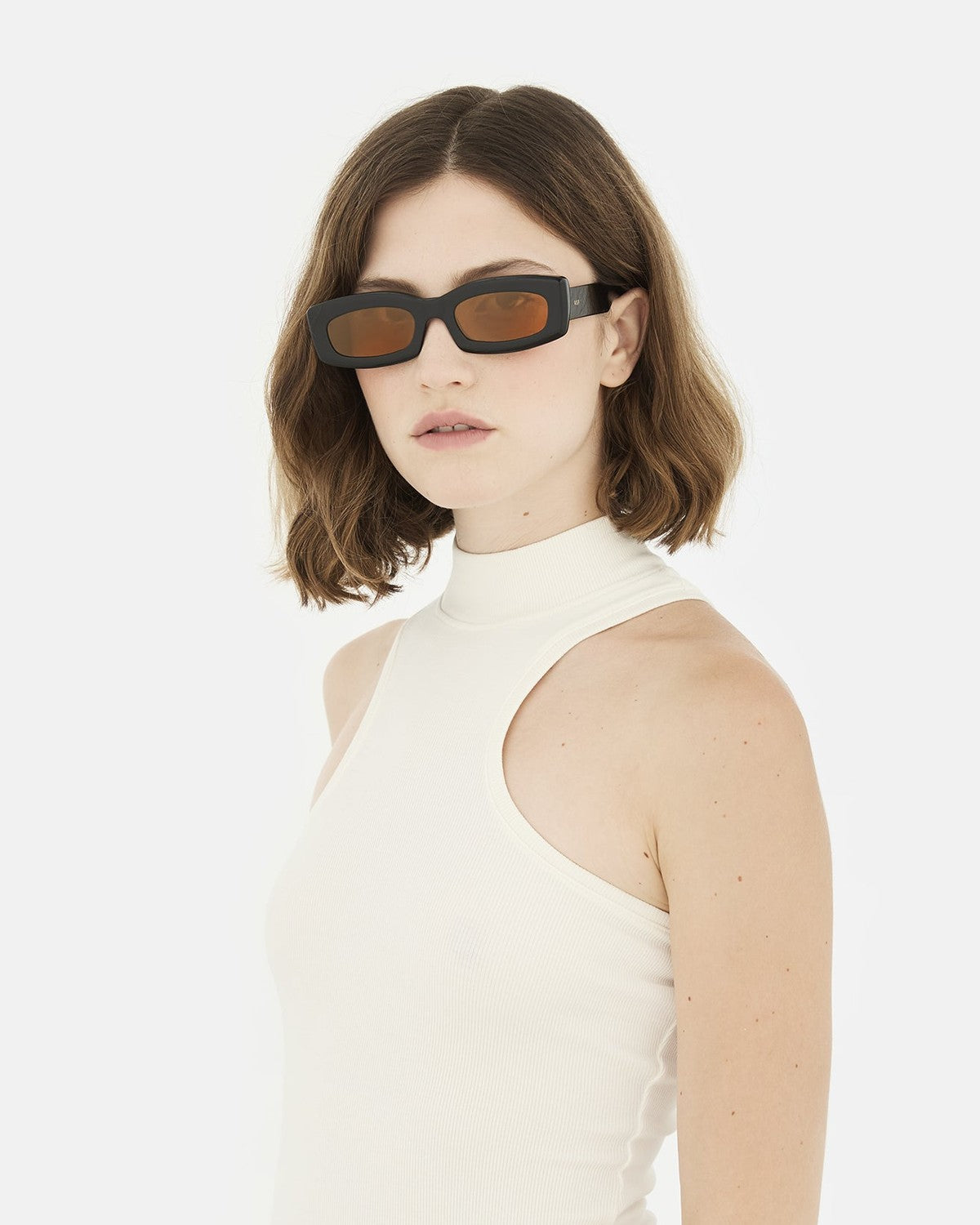 Model wearing RETROSUPERFUTURE Zaga Refined sunglasses.