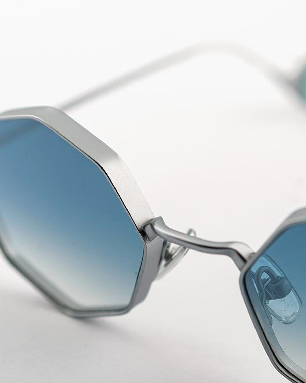 Close-up of the bridge and gradient blue lens on EYEPETIZER ZUBIZURI C.1-26F sunglasses.